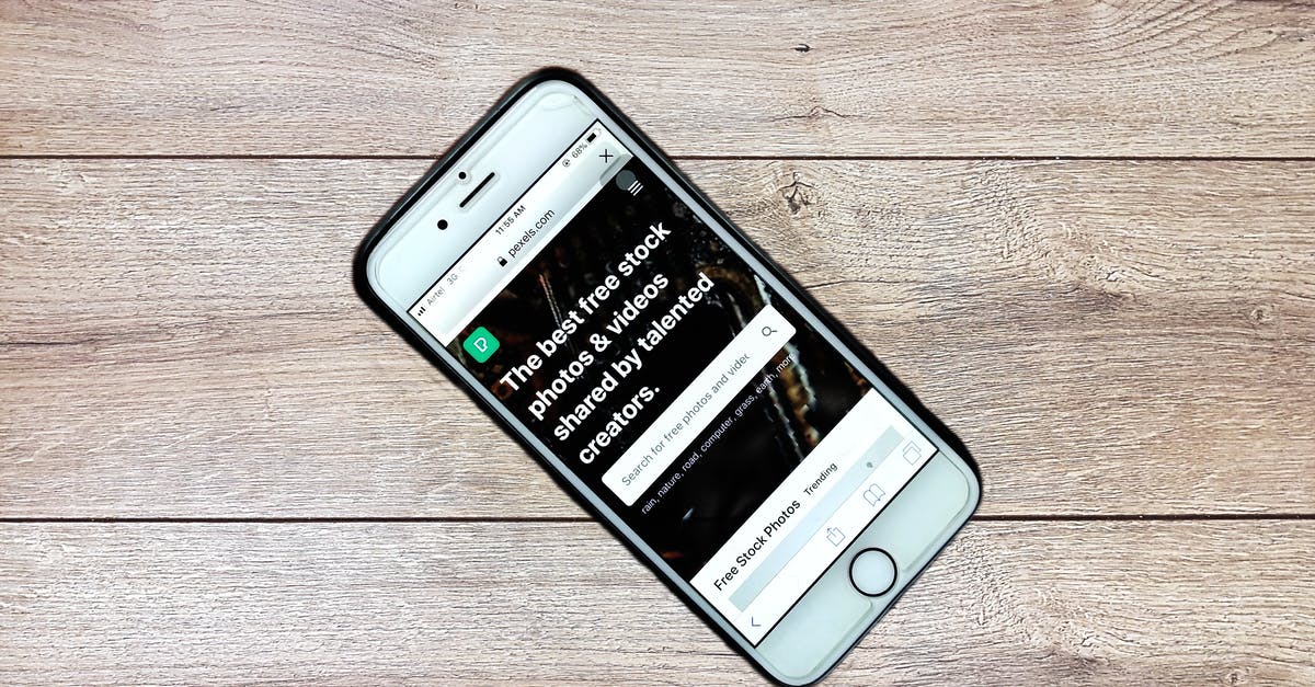 Using a ceramic honing rod for Global knives? - Top view contemporary mobile phone with opened website on screen placed on wooden table