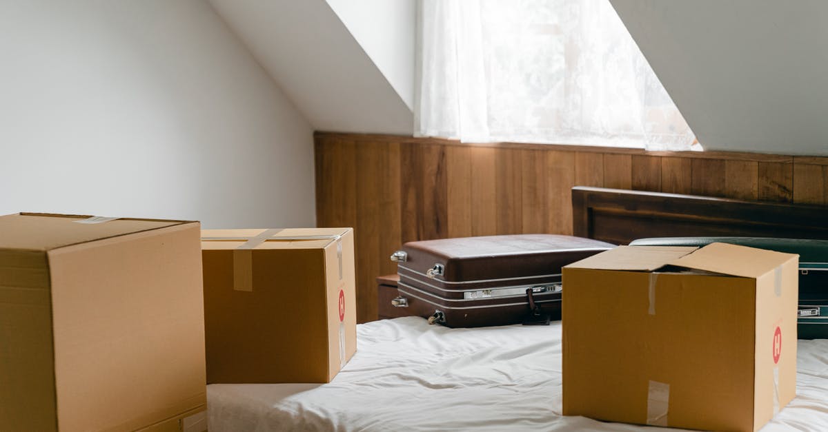 Using a Jelly Bag - Small cardboard boxes and leather cases placed on bed with sheet near big box in light room of house under sloping roof Using a Jelly Bag - Small cardboard boxes and leather cases placed on bed with sheet near big box in light room of house under sloping roof