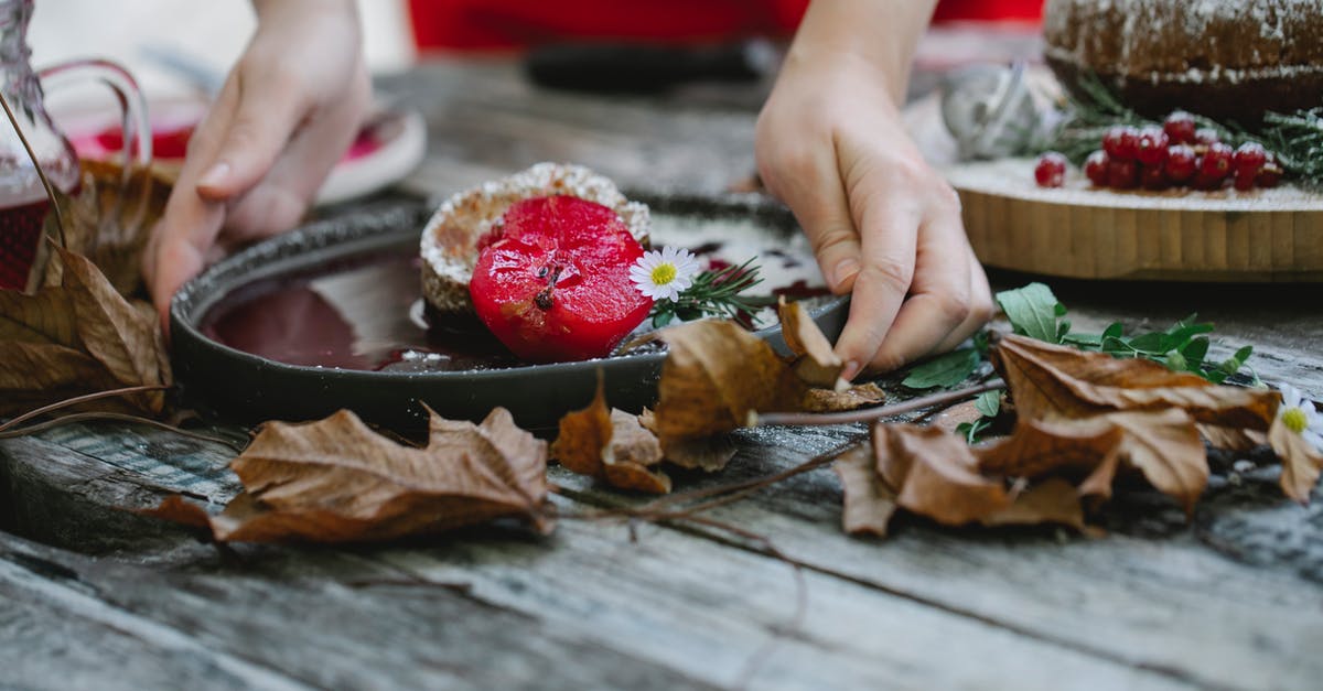 Using both cook and serve pudding and instant pudding in pie - Crop unrecognizable woman serving scrumptious pie on wooden table