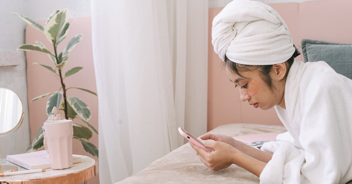 Using carob as a substitute for cocoa - Woman in White Hijab Holding Smartphone