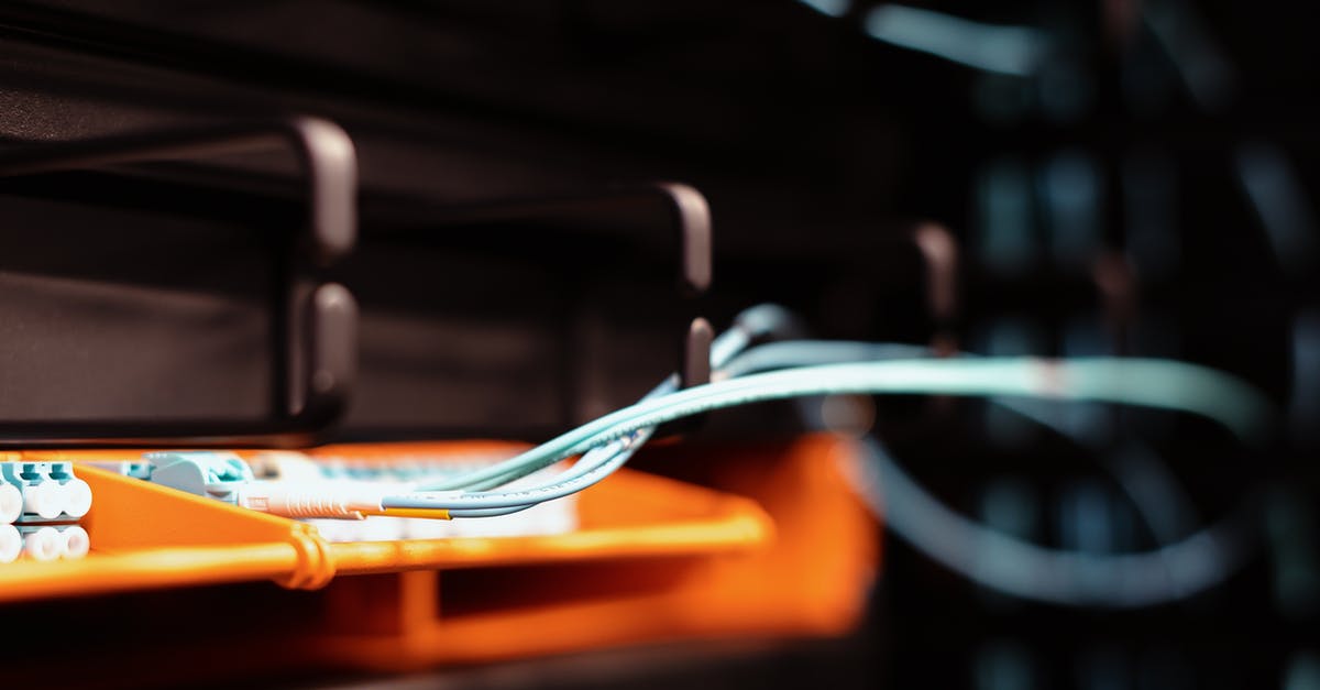 using crumbs mixture multiple times [is it safe?] - Blue wires connected to contemporary electronic equipment with multiple inputs on blur background