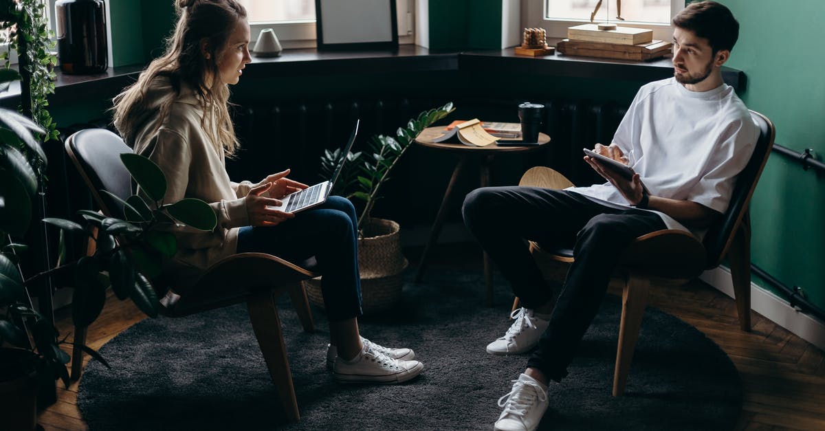 Using cultured buttermilk to introduce cultures to cheese - Photo of Man and Woman Talking to Each Other Using cultured buttermilk to introduce cultures to cheese - Photo of Man and Woman Talking to Each Other