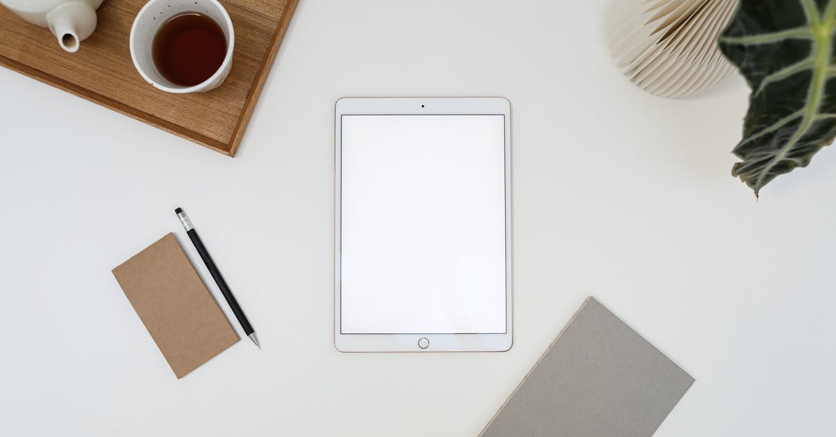 Using decorative loaf pans - Light workplace with tablet with blank screen Using decorative loaf pans - Light workplace with tablet with blank screen