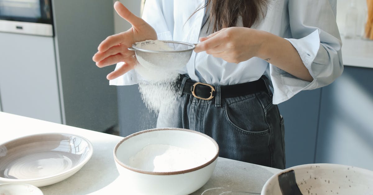 Using Elderberries in Cooking - Woman in White Button Up Shirt Holding White Ceramic Bowl Using Elderberries in Cooking - Woman in White Button Up Shirt Holding White Ceramic Bowl