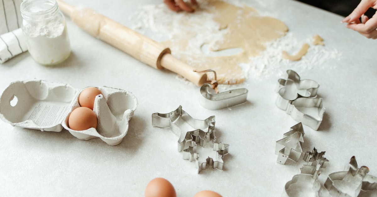 Using fridge for slow rise dough with eggs - Person Preparing Dough For Baking Using fridge for slow rise dough with eggs - Person Preparing Dough For Baking