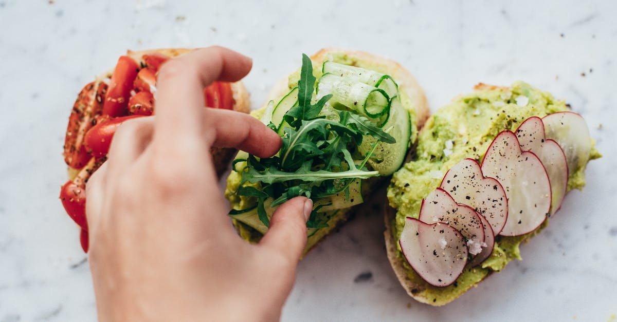 Using Italian Bread for French Toast? - From above of crop anonymous person adding arugula on bruschetta with cucumber and avocado placed near slices of bread with tomatoes and radish Using Italian Bread for French Toast? - From above of crop anonymous person adding arugula on bruschetta with cucumber and avocado placed near slices of bread with tomatoes and radish