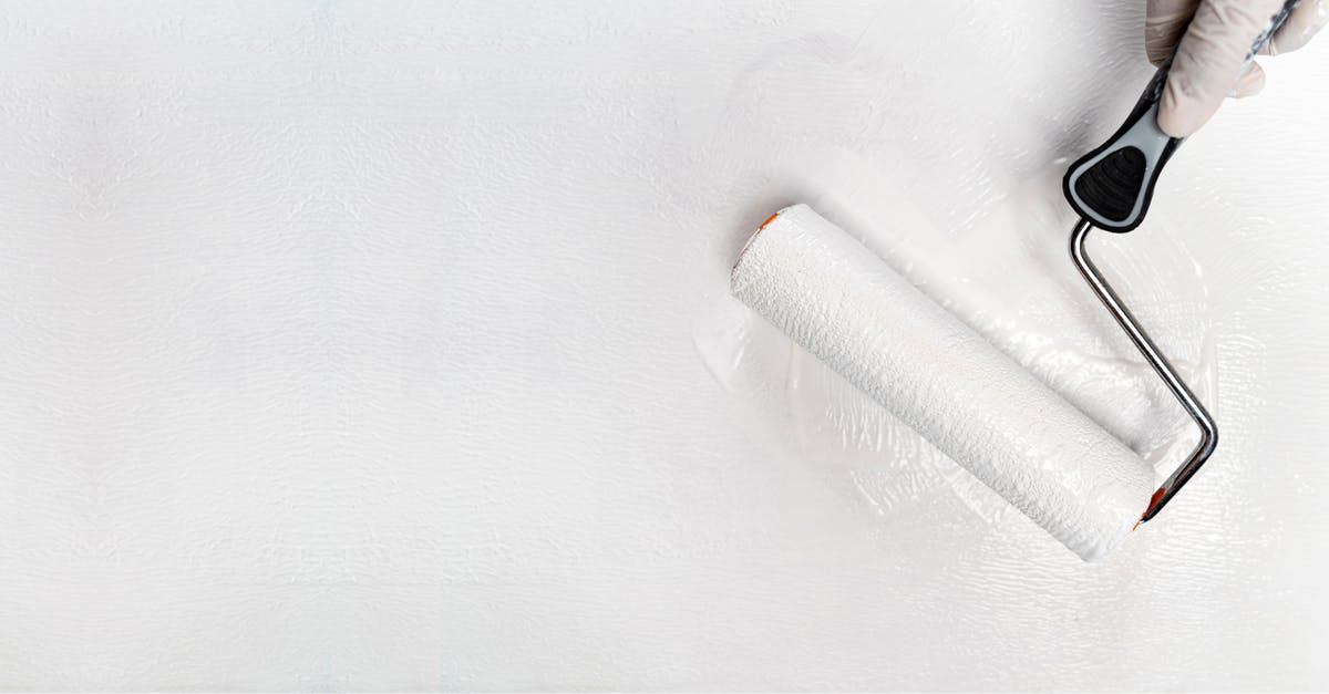 Using liquid nitrogen for tenderizing octopus? - Crop anonymous person in latex gloves using roller brush with white color while painting wall during home renovation Using liquid nitrogen for tenderizing octopus? - Crop anonymous person in latex gloves using roller brush with white color while painting wall during home renovation