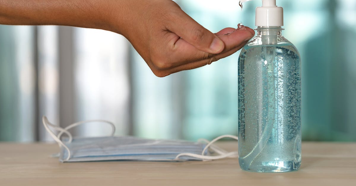 Using liquid nitrogen for tenderizing octopus? - Faceless person using antibacterial gel from dispenser during quarantine period Using liquid nitrogen for tenderizing octopus? - Faceless person using antibacterial gel from dispenser during quarantine period