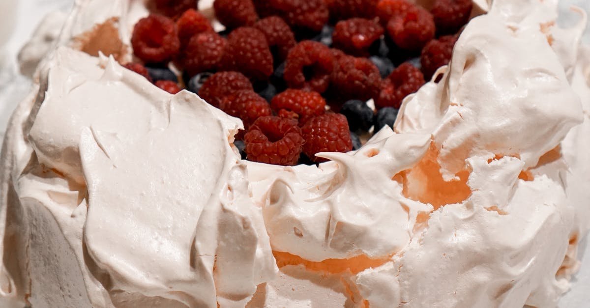 Using nuts in pavlova meringue - Close Up Shot of a Cake