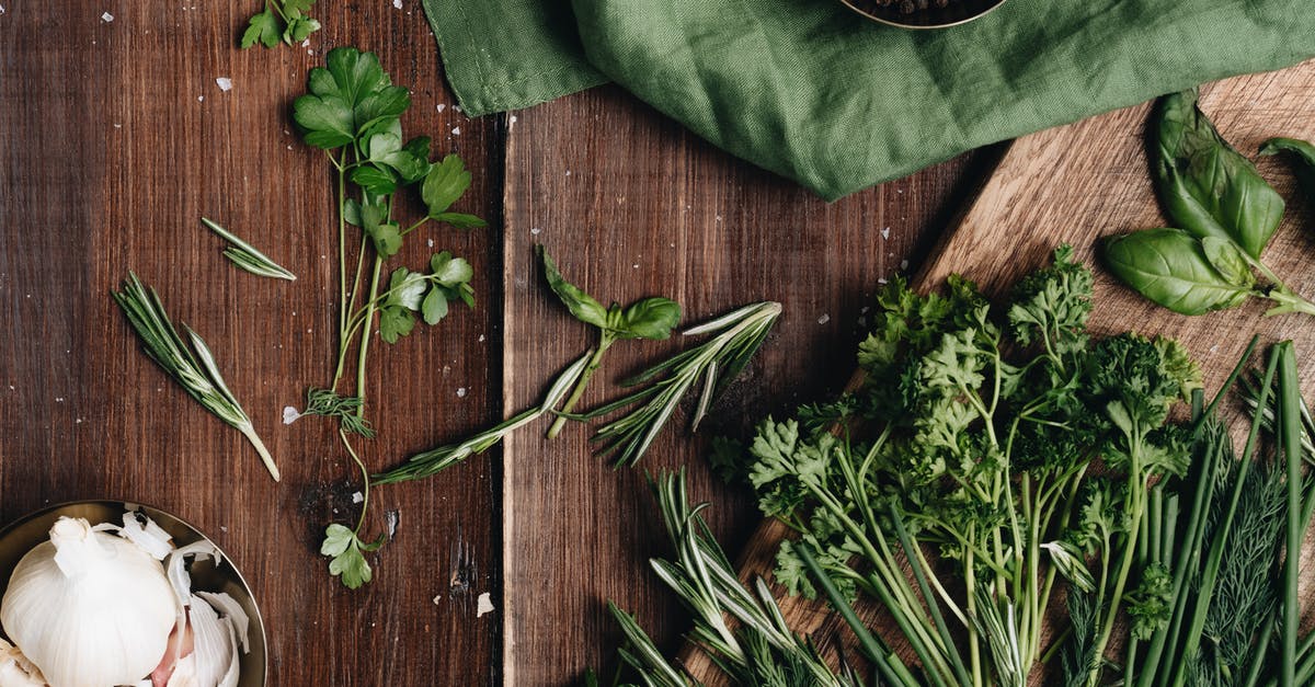 Using parsley and thyme in a brine - Close-Up Photo Of Green Herbs Using parsley and thyme in a brine - Close-Up Photo Of Green Herbs