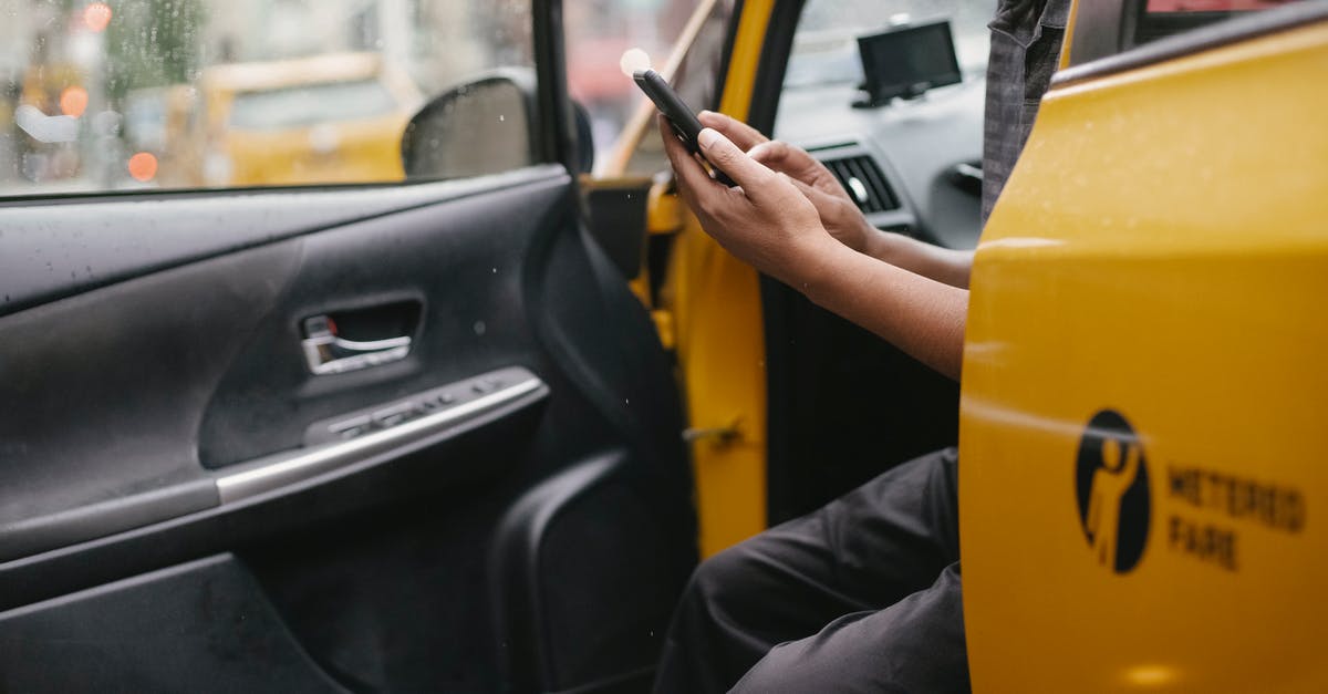Using yellow mustard as a soup base - Unrecognizable man sitting in car Using yellow mustard as a soup base - Unrecognizable man sitting in car