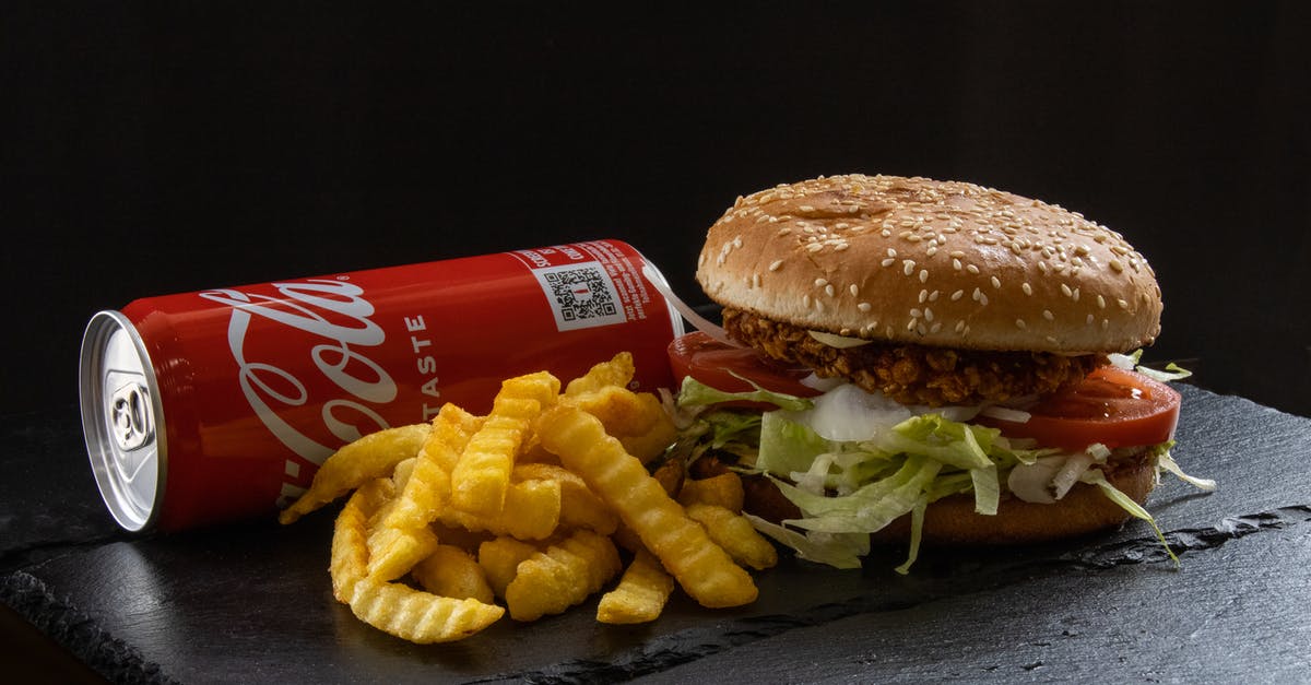 Veg Burger Advice, Am i missing something? - Chicken burger menu with coke and french fries on a black background isolated Veg Burger Advice, Am i missing something? - Chicken burger menu with coke and french fries on a black background isolated