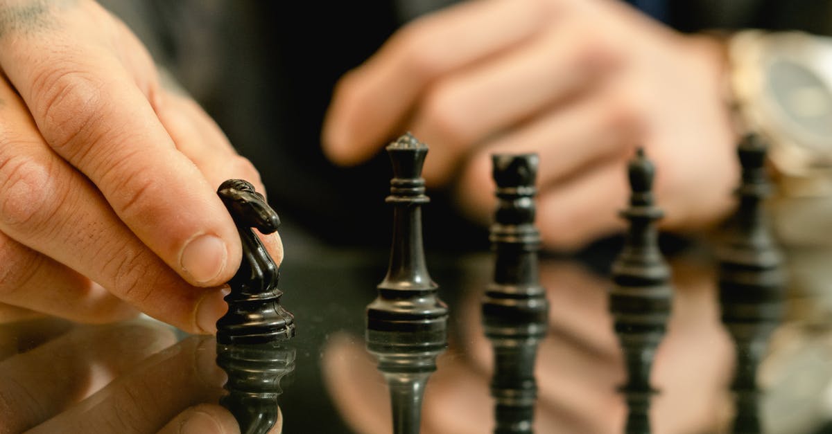 Vinegar choice for pickling - Person Holding Black Chess Piece