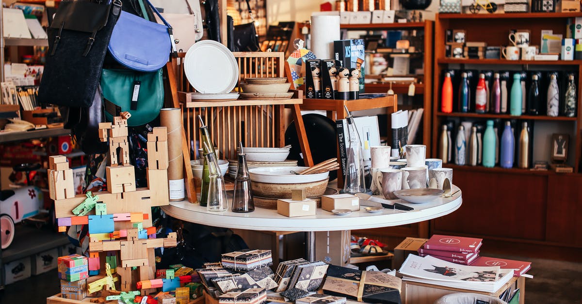 Want to bottle and sell a marinade/sauce [closed] - Table with various goods in shop