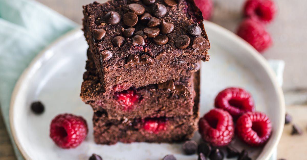 War-zone chocolate brownies (edible decor) - Close-Up Photo Of Stacked Brownies War-zone chocolate brownies (edible decor) - Close-Up Photo Of Stacked Brownies
