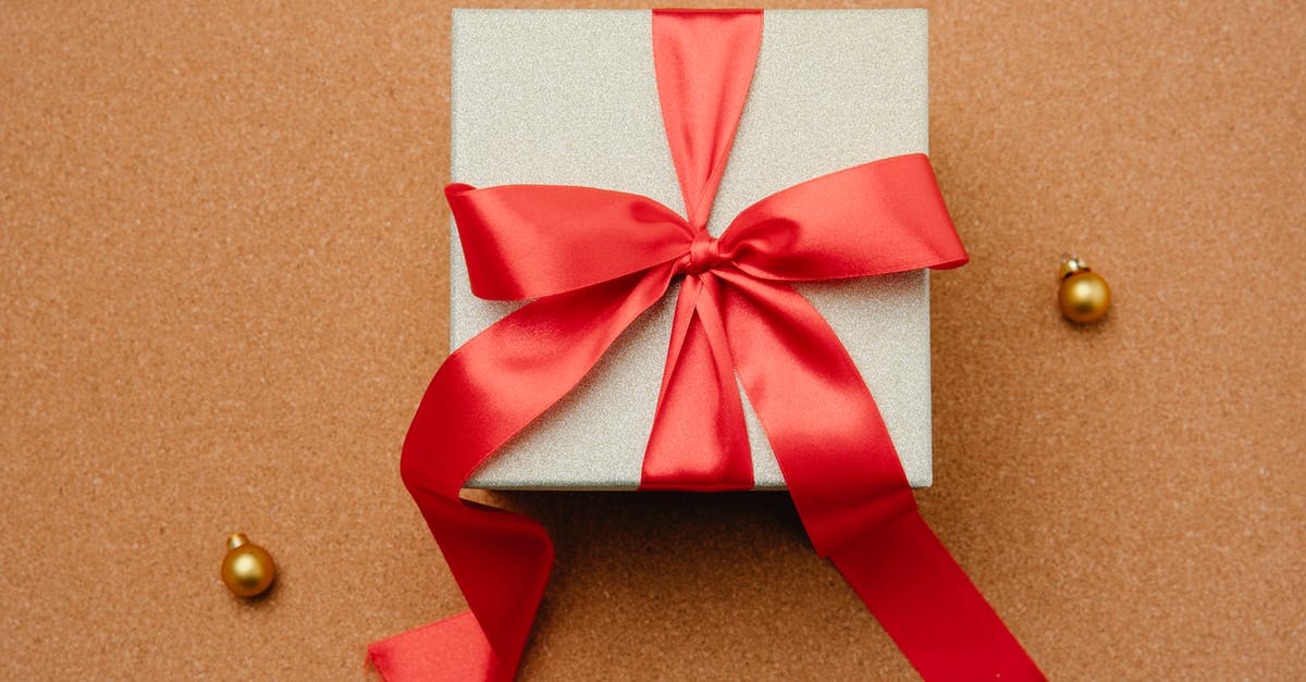 Wax paper sticking to homemade taffy - what to use for wrapping? - Gift box with ribbon on table Wax paper sticking to homemade taffy - what to use for wrapping? - Gift box with ribbon on table