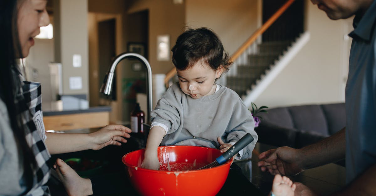 Ways to make my cooking routine more efficient? - Couple Watching Their Child Play With Mixture In A Bowk Ways to make my cooking routine more efficient? - Couple Watching Their Child Play With Mixture In A Bowk
