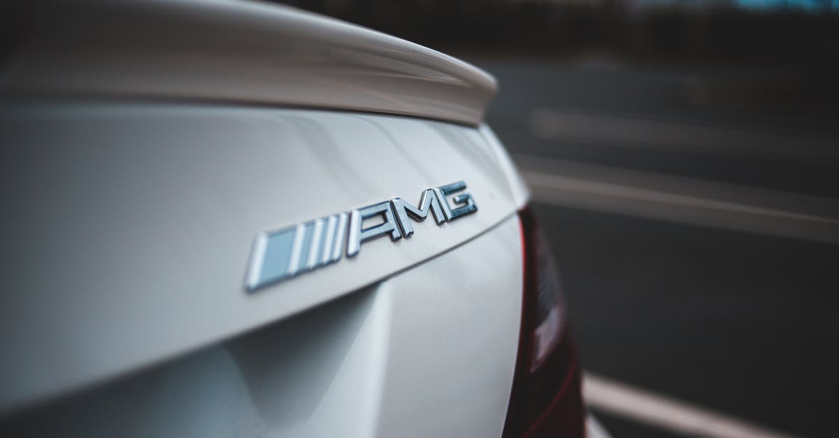 Ways to speed up this chai recipe? - Closeup of chrome logotype on trunk of new shiny white modern car driving on asphalt road Ways to speed up this chai recipe? - Closeup of chrome logotype on trunk of new shiny white modern car driving on asphalt road