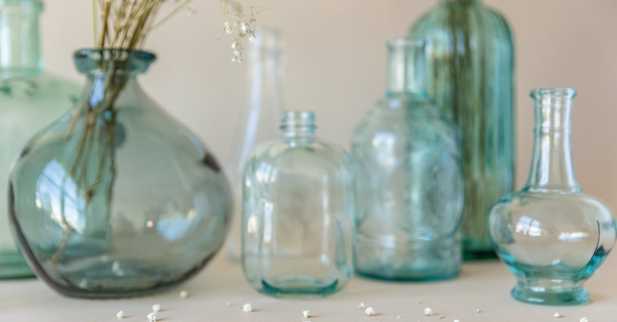 What's 香茜 or 芫荽 in English? - Three Clear Glass Bottles on White Table What's 香茜 or 芫荽 in English? - Three Clear Glass Bottles on White Table