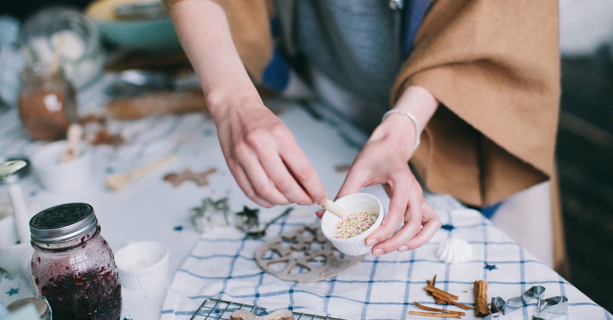 What's the best way to stick sprinkles to cookies without icing? - Gingerbread on Grill Grate Near Jar of Jam on Table What's the best way to stick sprinkles to cookies without icing? - Gingerbread on Grill Grate Near Jar of Jam on Table