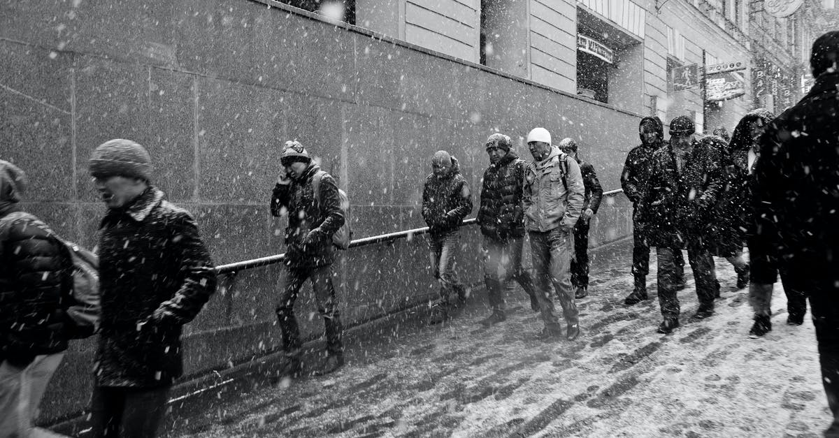 What's the best way to warm a baguette? - Crowd of people going down to passage on city street What's the best way to warm a baguette? - Crowd of people going down to passage on city street