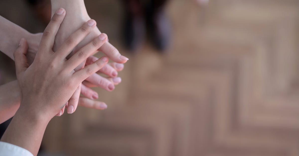 What's the deal with split-top bread? - Crop group stacking hands together What's the deal with split-top bread? - Crop group stacking hands together