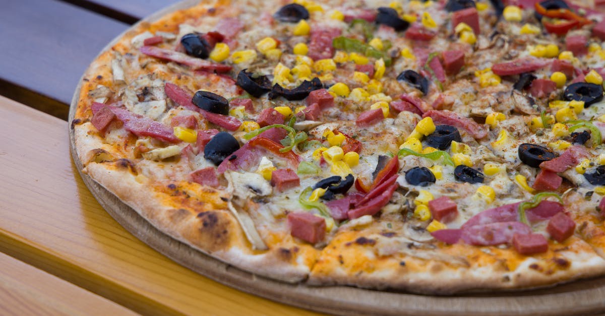 What's the difference between bacon and gammon? - Pizza on Brown Wooden Tray What's the difference between bacon and gammon? - Pizza on Brown Wooden Tray