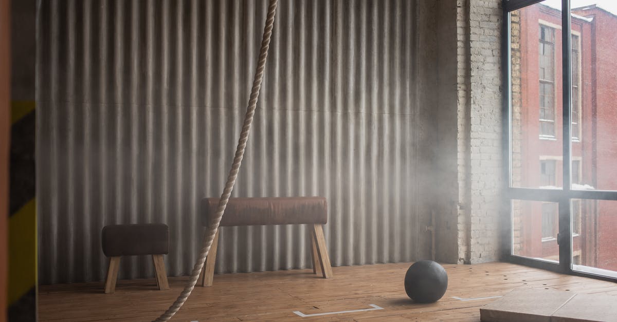 What's the functional different between a skillet and a saute pan? - Battle rope and slam ball on floor in gym
