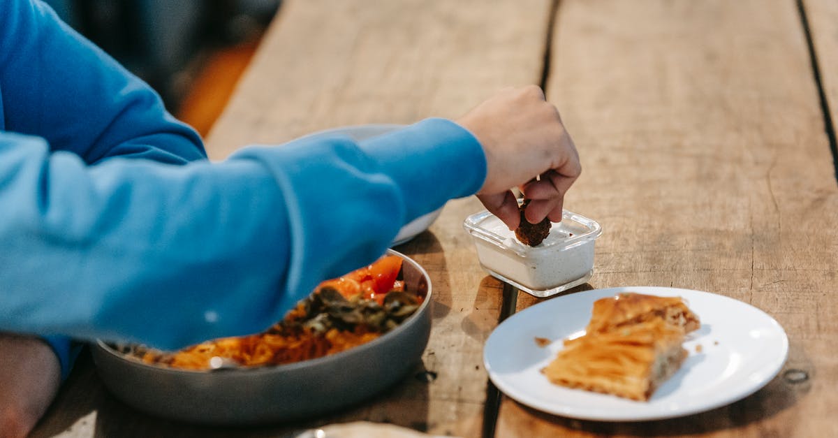 What's the point of using sugar in savory dishes? - Man having supper with tasty dish and baklava What's the point of using sugar in savory dishes? - Man having supper with tasty dish and baklava