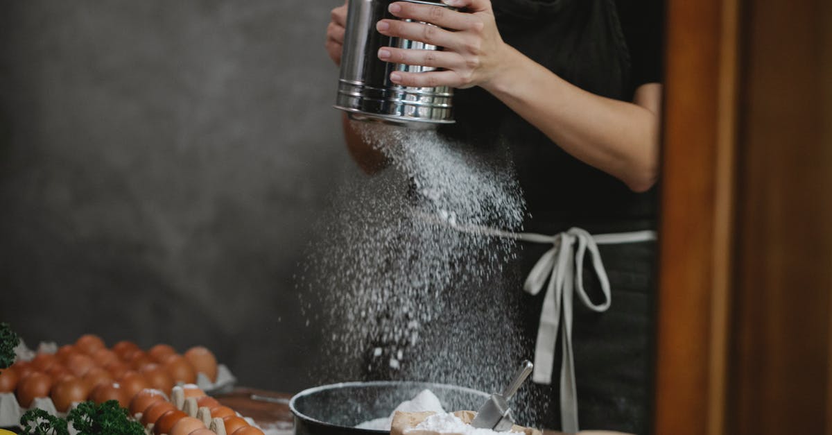 What's the process of making black garlic called? - Anonymous chef cooking pasta on table near ingredients What's the process of making black garlic called? - Anonymous chef cooking pasta on table near ingredients
