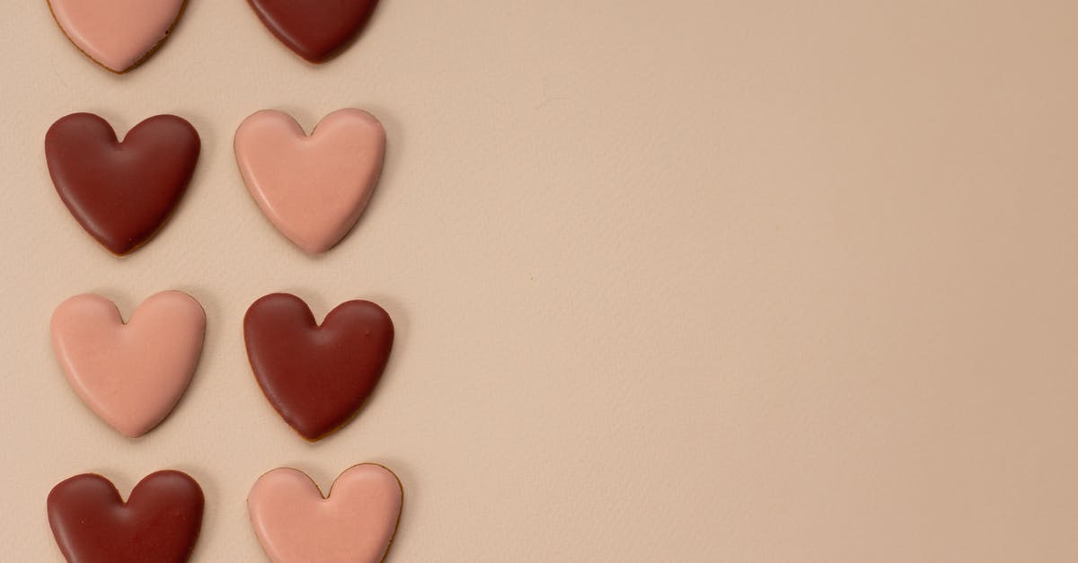 What's the recommended temperature for chocolate to set? - Arrangement of heart shaped candies What's the recommended temperature for chocolate to set? - Arrangement of heart shaped candies