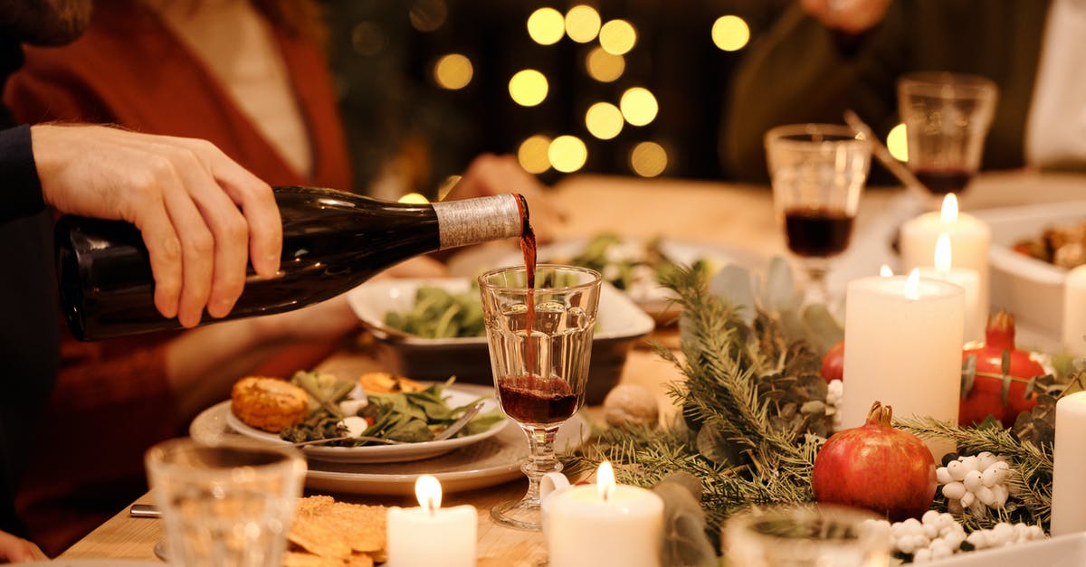 What's the secret to getting restaurant-quality frozen drinks at home? - Person Pouring Wine on Glass What's the secret to getting restaurant-quality frozen drinks at home? - Person Pouring Wine on Glass