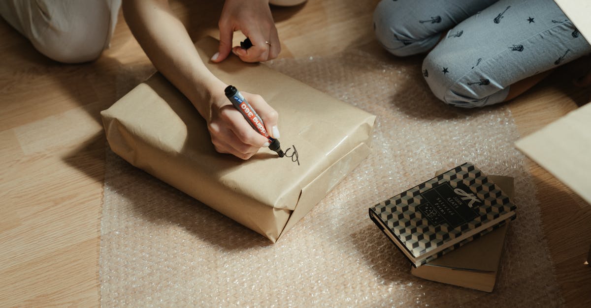 What's the trick to wrapping tightly in plastic wrap? - Person in Blue Denim Jeans Holding Black Pen What's the trick to wrapping tightly in plastic wrap? - Person in Blue Denim Jeans Holding Black Pen