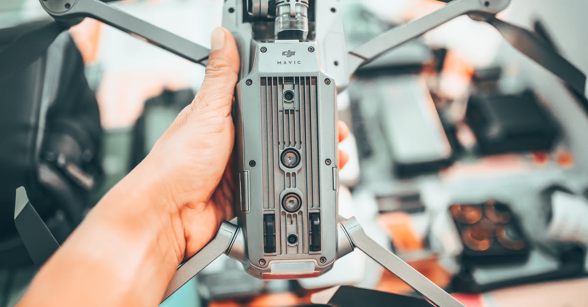 What's the use of the hexagon bottom in braisers? - Crop faceless man showing drone bottom part What's the use of the hexagon bottom in braisers? - Crop faceless man showing drone bottom part