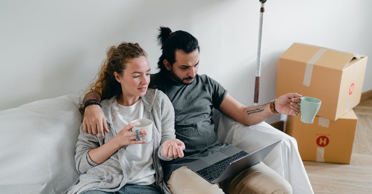 What's this odd stuff coming out of my meringue? - Bonding couple browsing laptop after packing carton boxes What's this odd stuff coming out of my meringue? - Bonding couple browsing laptop after packing carton boxes