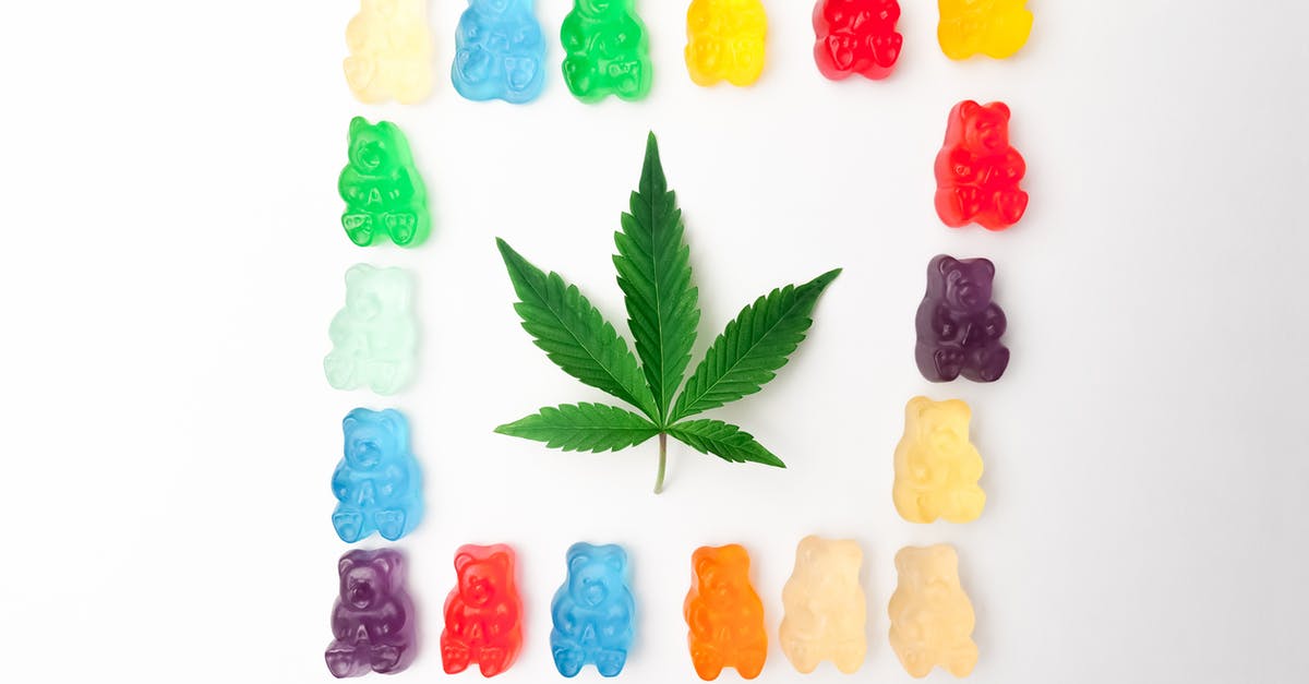 What's this off-white particulate stuff on my pickled asparagus? - Photo of Gummy Bears on White Background What's this off-white particulate stuff on my pickled asparagus? - Photo of Gummy Bears on White Background