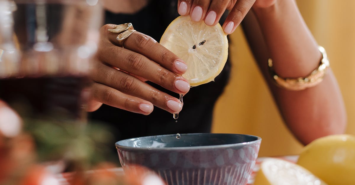 What alternatives do exists for properly squeezing lemons? - Close up on Woman Squeezing Lemon Slice What alternatives do exists for properly squeezing lemons? - Close up on Woman Squeezing Lemon Slice
