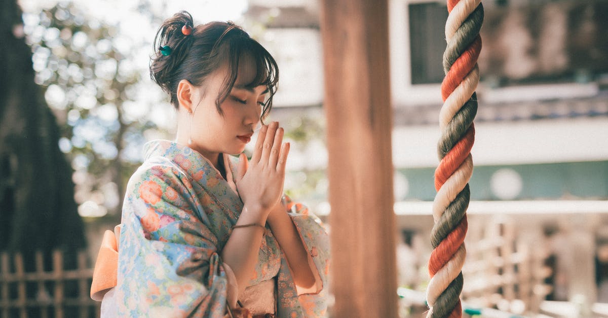 What are common/traditional uses for merguez? [closed] - Woman in Green and Pink Floral Robe Covering Her Face With Her Hands