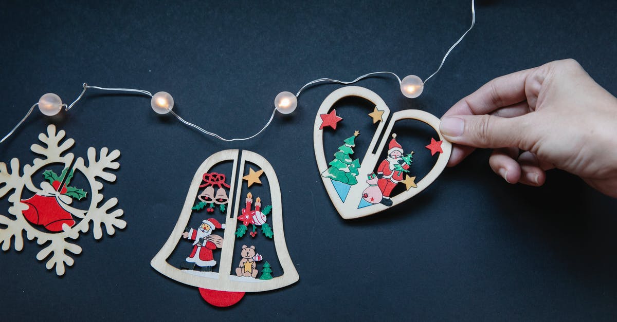What are different ways to roast Bell Peppers? - Faceless person near Christmas decorations with garland on surface What are different ways to roast Bell Peppers? - Faceless person near Christmas decorations with garland on surface