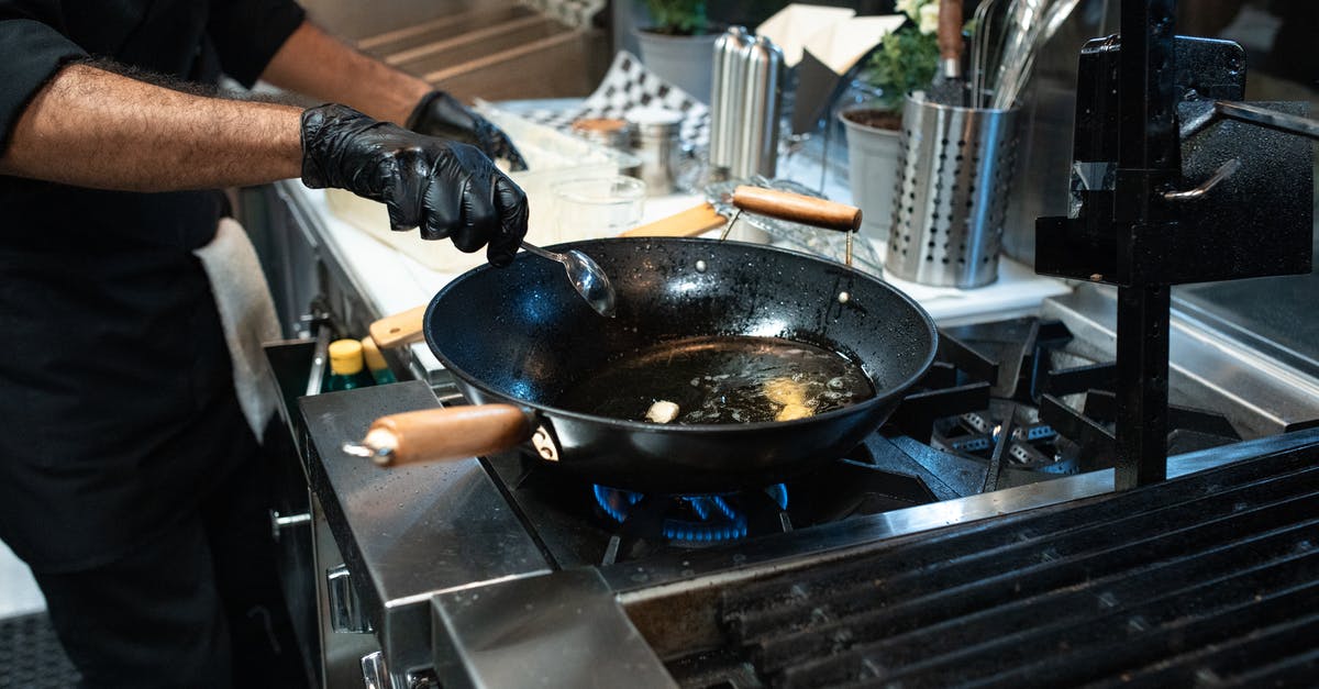 What are frying pan ridges for? - Person Cooking on Black Pan What are frying pan ridges for? - Person Cooking on Black Pan