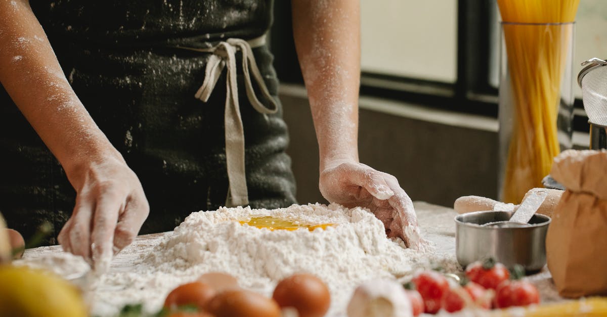 What are other techniques to make garlic bread? - Cook preparing dough with flour and eggs