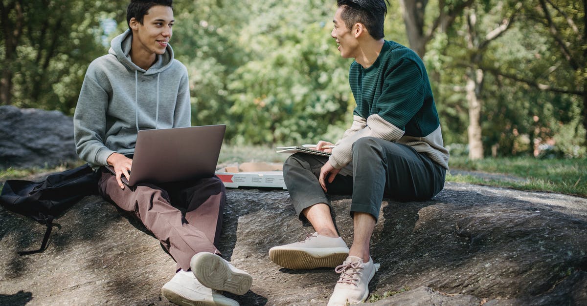 What are other uses for a pizza stone? - Full body of positive multiracial classmates sharing information on university assignment while browsing laptop in nature What are other uses for a pizza stone? - Full body of positive multiracial classmates sharing information on university assignment while browsing laptop in nature