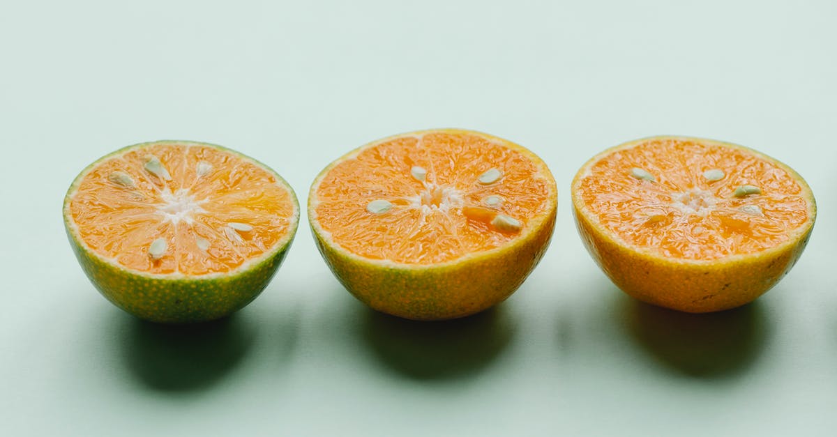 What are the advantages of seasoned cast iron vs enameled cast iron? - Halves of fresh ripe citruses in row What are the advantages of seasoned cast iron vs enameled cast iron? - Halves of fresh ripe citruses in row
