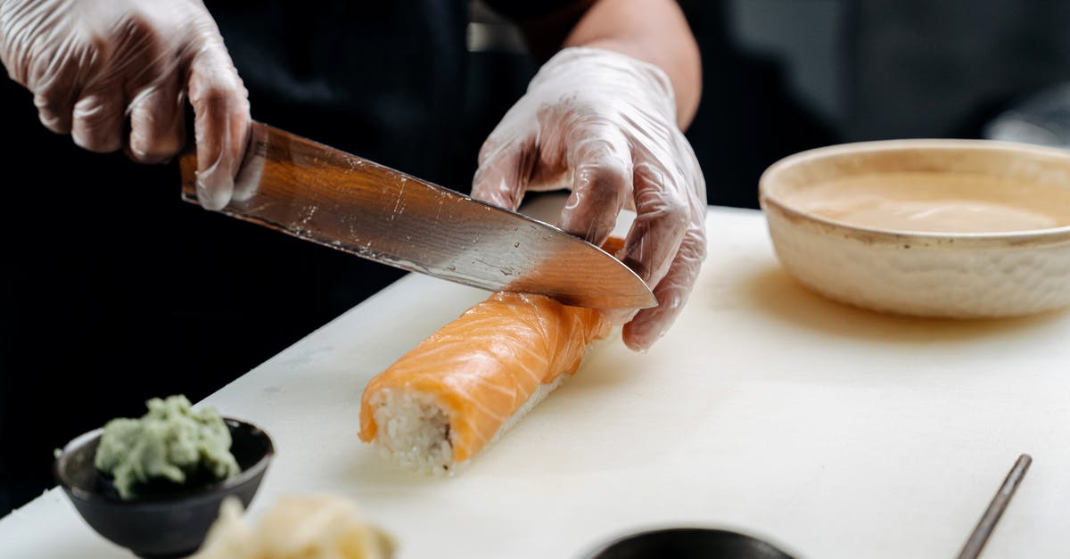 What are the best suggestions for cutting gloves - A Person Cutting Sushi What are the best suggestions for cutting gloves - A Person Cutting Sushi