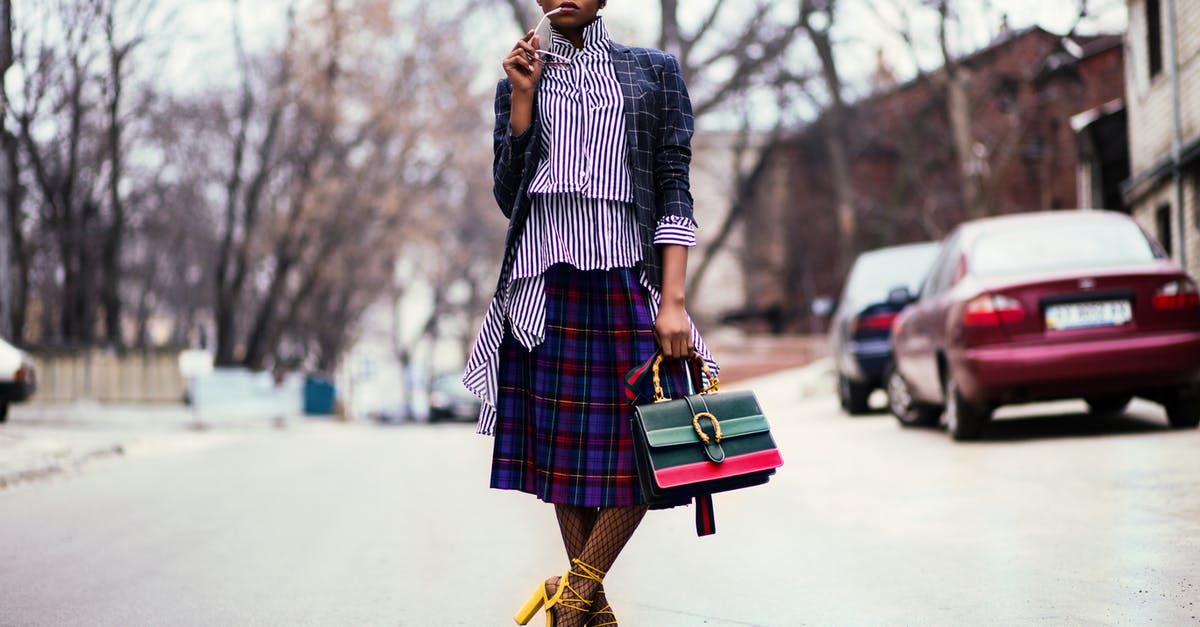 What are the difference between outside and inside skirt steak? - Woman Holding Handbag Beside Red Car on Road What are the difference between outside and inside skirt steak? - Woman Holding Handbag Beside Red Car on Road