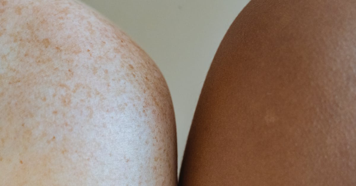 What are the different parts of a zester called? - Shoulders of multiracial models against light wall What are the different parts of a zester called? - Shoulders of multiracial models against light wall