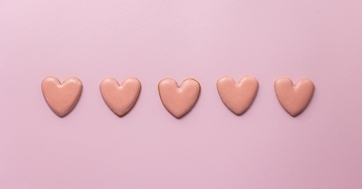 What are the major differences between yams and sweet potatoes? - Top view of various handmade small cookies in heart shape placed on pink background next to each other What are the major differences between yams and sweet potatoes? - Top view of various handmade small cookies in heart shape placed on pink background next to each other