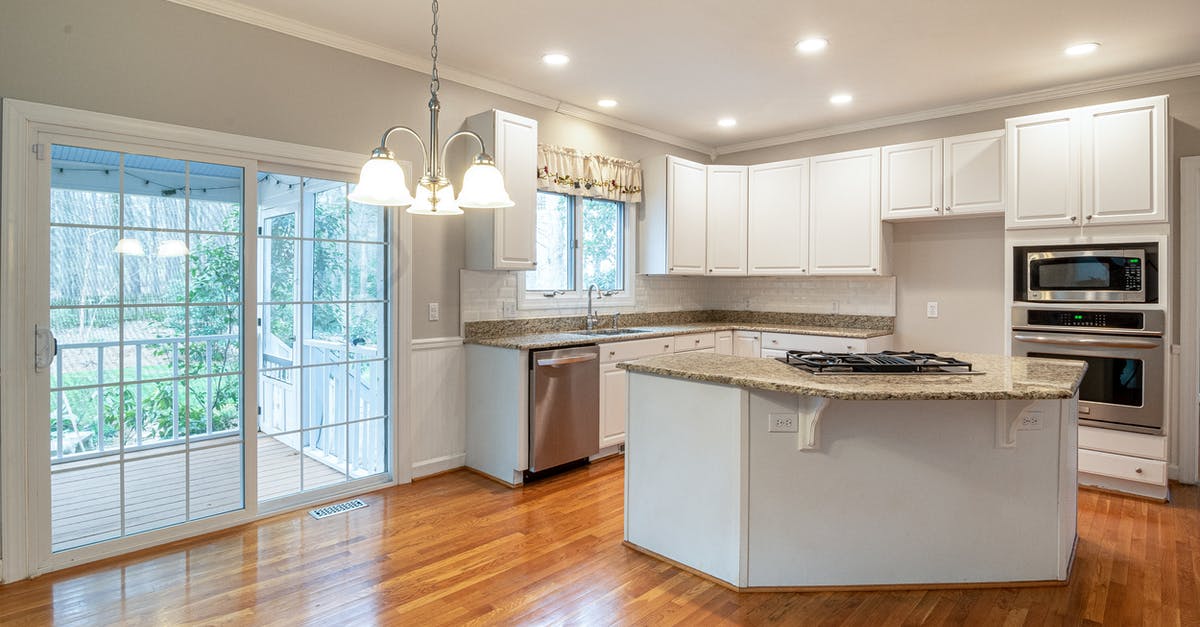 What are the pros and cons of Convection Microwave Ovens? - White and Brown Kitchen Counter