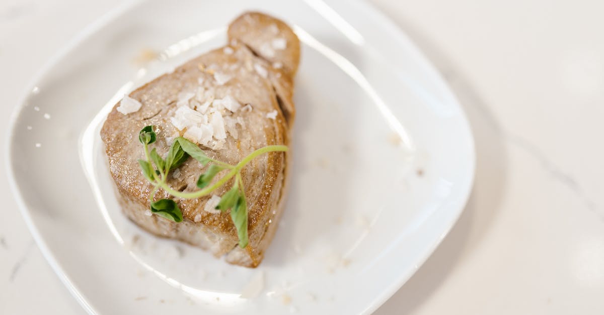 What are the tasteful herbs served with dizi in Iran? - Chunk of Fried Tuna Fish Meat Served with Herbs on White Plate What are the tasteful herbs served with dizi in Iran? - Chunk of Fried Tuna Fish Meat Served with Herbs on White Plate