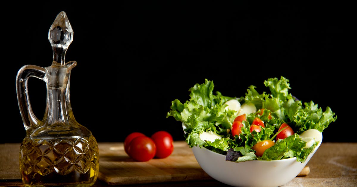 What are the transparent strands in this salad? - Vitamin vegetable salad on table with bottle of oil What are the transparent strands in this salad? - Vitamin vegetable salad on table with bottle of oil
